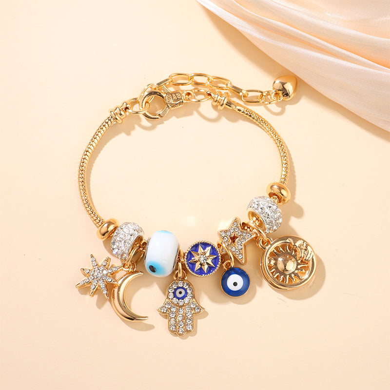 Armband mit Sonne-Mond-Anhänger „Celestial“
