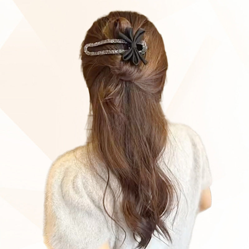 Glitzernde elegante schwarze Haarspange für Hochsteckfrisuren