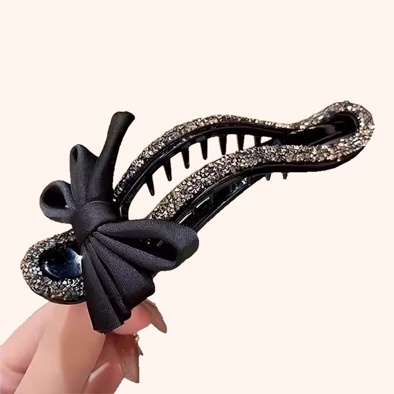 Glitzernde elegante schwarze Haarspange für Hochsteckfrisuren