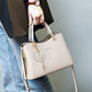 Elegante Damen-Tasche mit glänzendem Herzanhänger