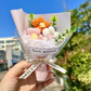 Bezaubernder handgestrickter Mini-Blumenstrauß