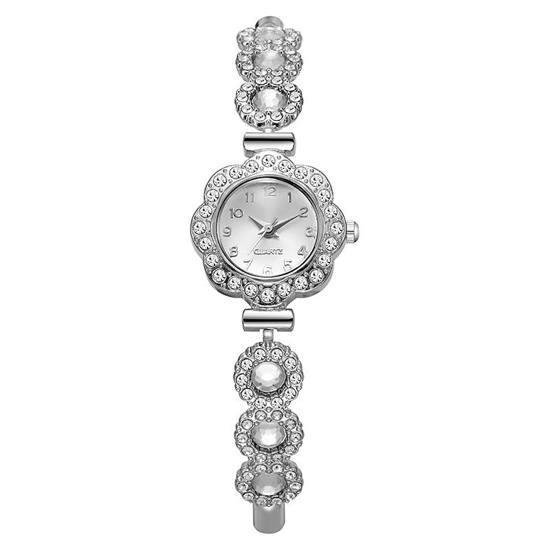 Elegante Damenuhr mit Strass-Blumen-Lünette
