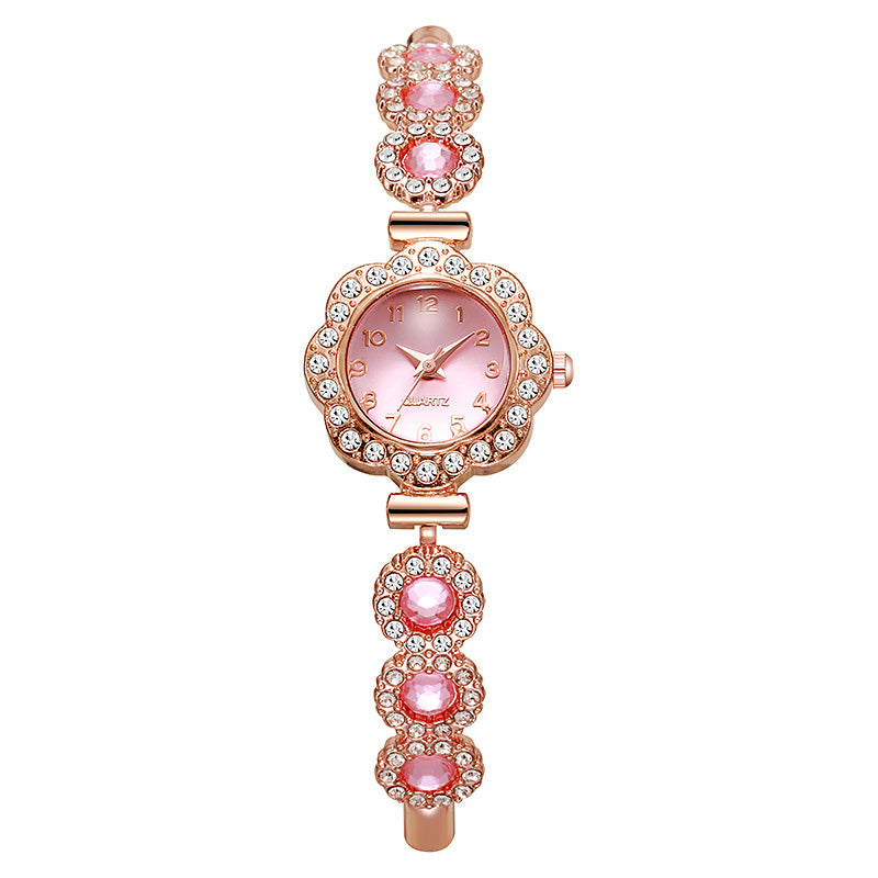 Elegante Damenuhr mit Strass-Blumen-Lünette