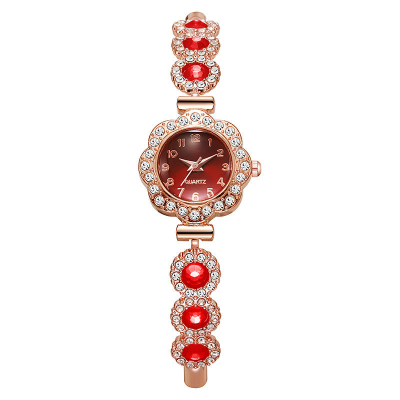 Elegante Damenuhr mit Strass-Blumen-Lünette