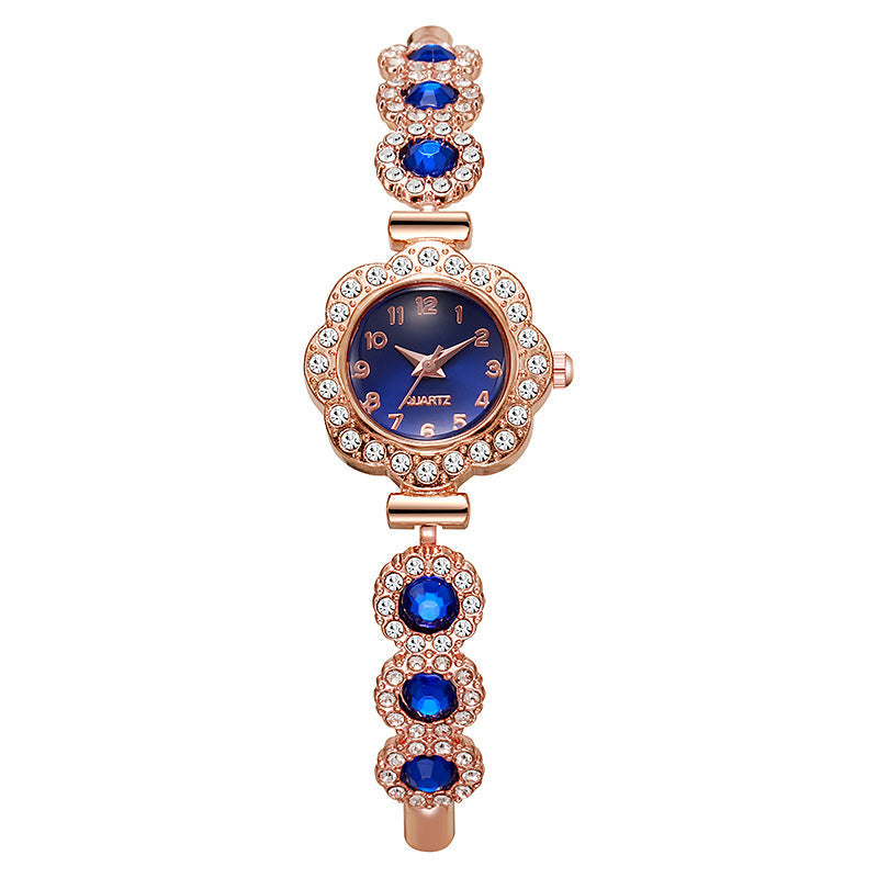 Elegante Damenuhr mit Strass-Blumen-Lünette